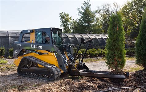 john deere skid steer with attachments|john deere skid steer tiller.